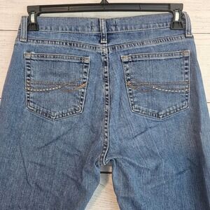 As Real As Wrangler 8 x 32 Boot Cut Mid Rise Stretch Med Wash Jeans 1106